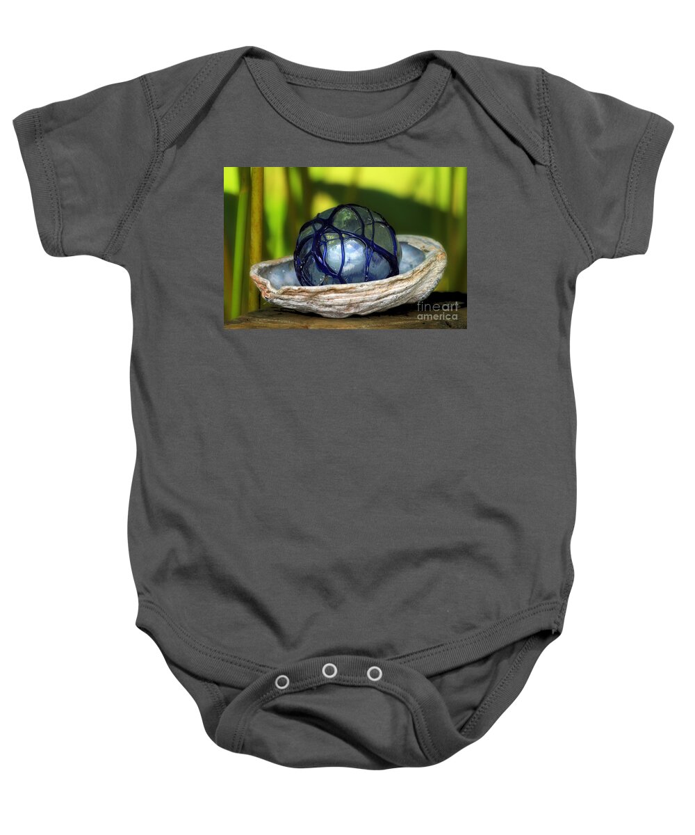 Still Life Baby Onesie featuring the photograph Glass Ball in a Sea Shell by Teresa Zieba