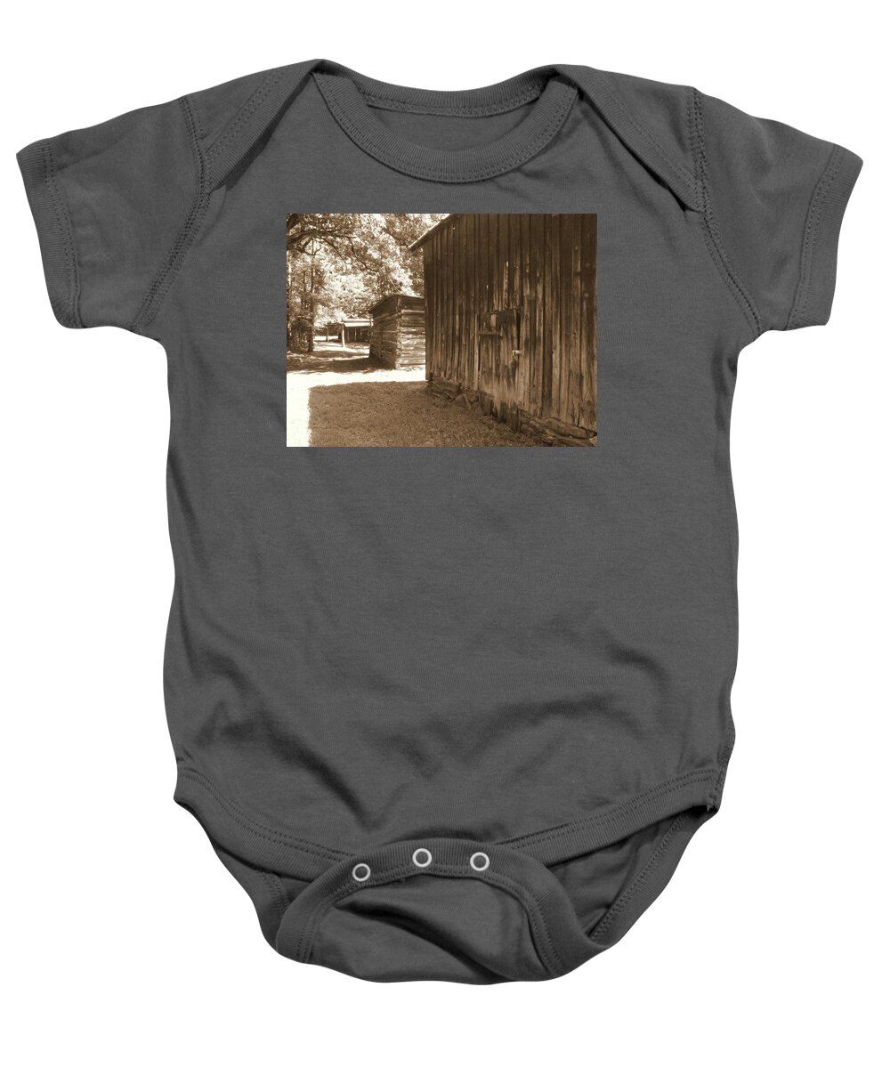 Tobacco Barns Baby Onesie featuring the photograph Historical Tobacco Barns NC USA by Kim Galluzzo