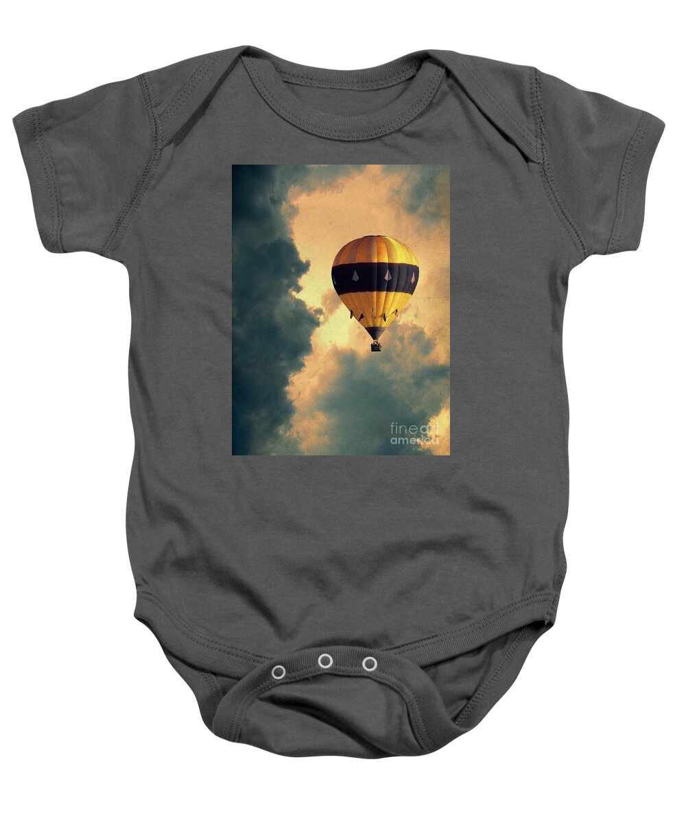 Clouds Baby Onesie featuring the photograph Hot Air Balloon in Stormy Sky by Jill Battaglia