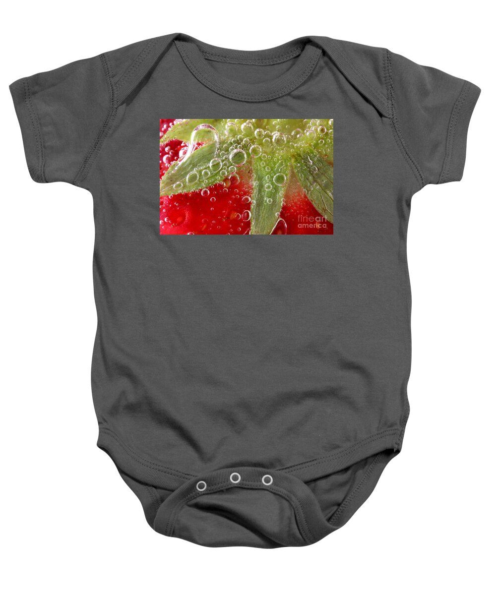 Strawberry Baby Onesie featuring the photograph Macro of strawberry in water by Simon Bratt