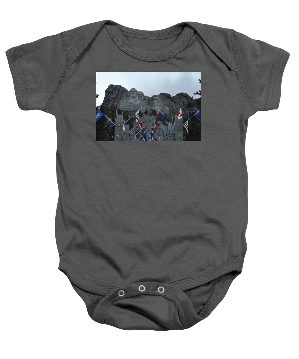 Mt. Rushmore National Monument Baby Onesie featuring the photograph Mt. Rushmore in the Evening by Frank Madia