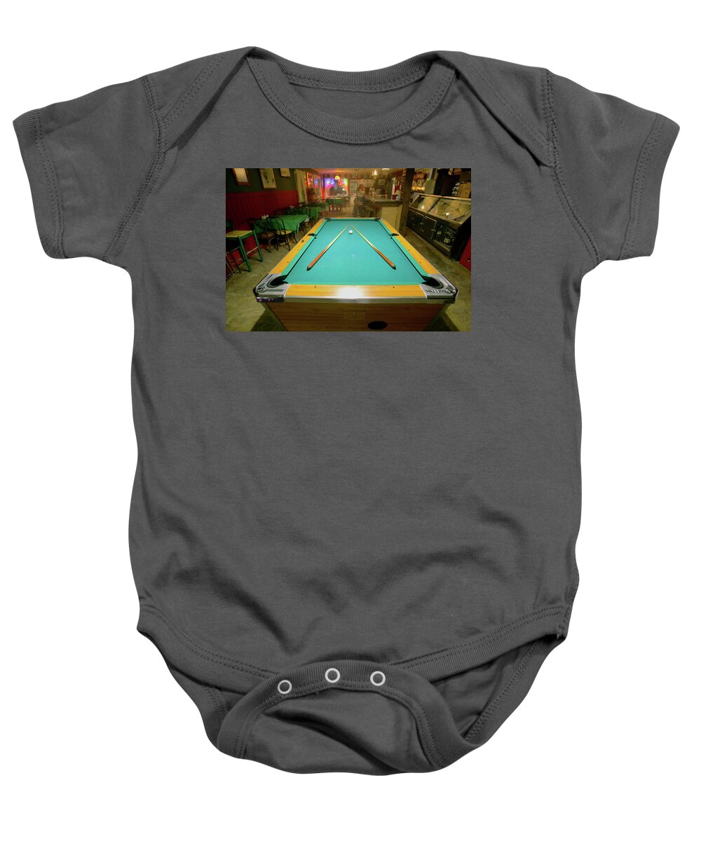 Photography Baby Onesie featuring the photograph Pool Table Lit By Electric Lights by Panoramic Images