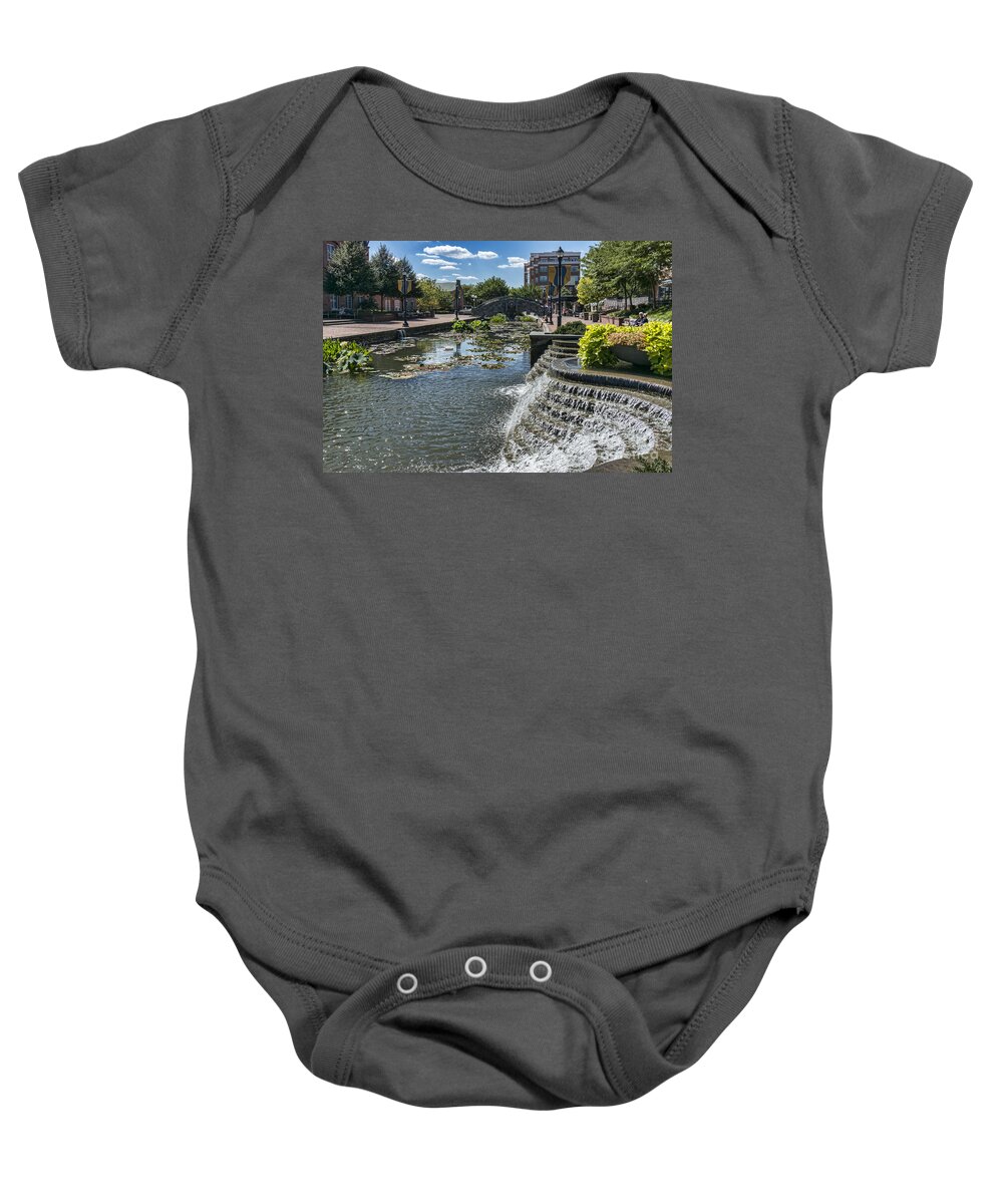 Carroll Creek Baby Onesie featuring the photograph Promenade and waterfall in Carroll Creek Park in Frederick Mary by William Kuta