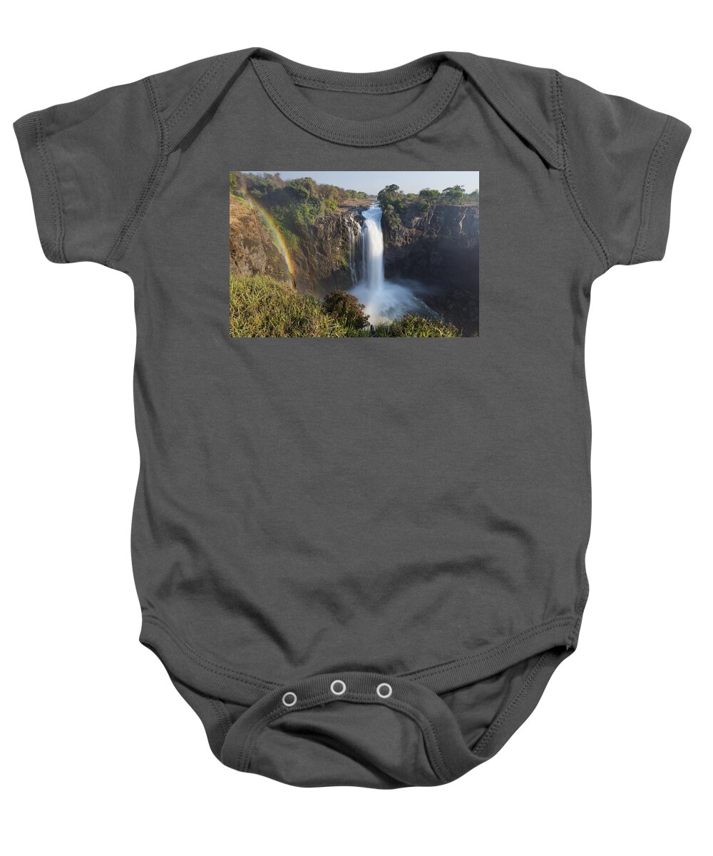 Vincent Grafhorst Baby Onesie featuring the photograph Rainbow In The Mist Of Victoria Falls by Vincent Grafhorst