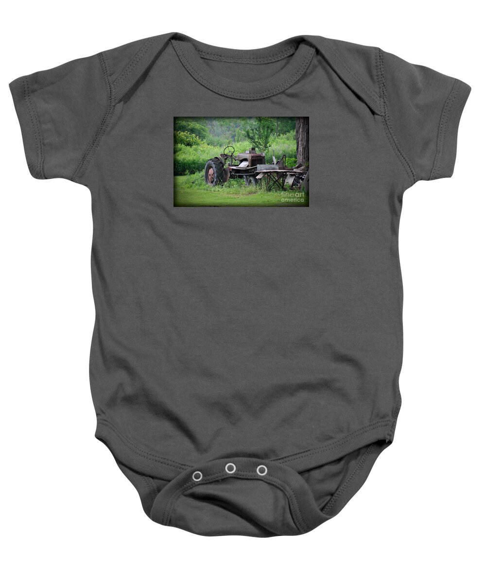 Farmland Baby Onesie featuring the photograph Retired Old Tractor by Gary Keesler