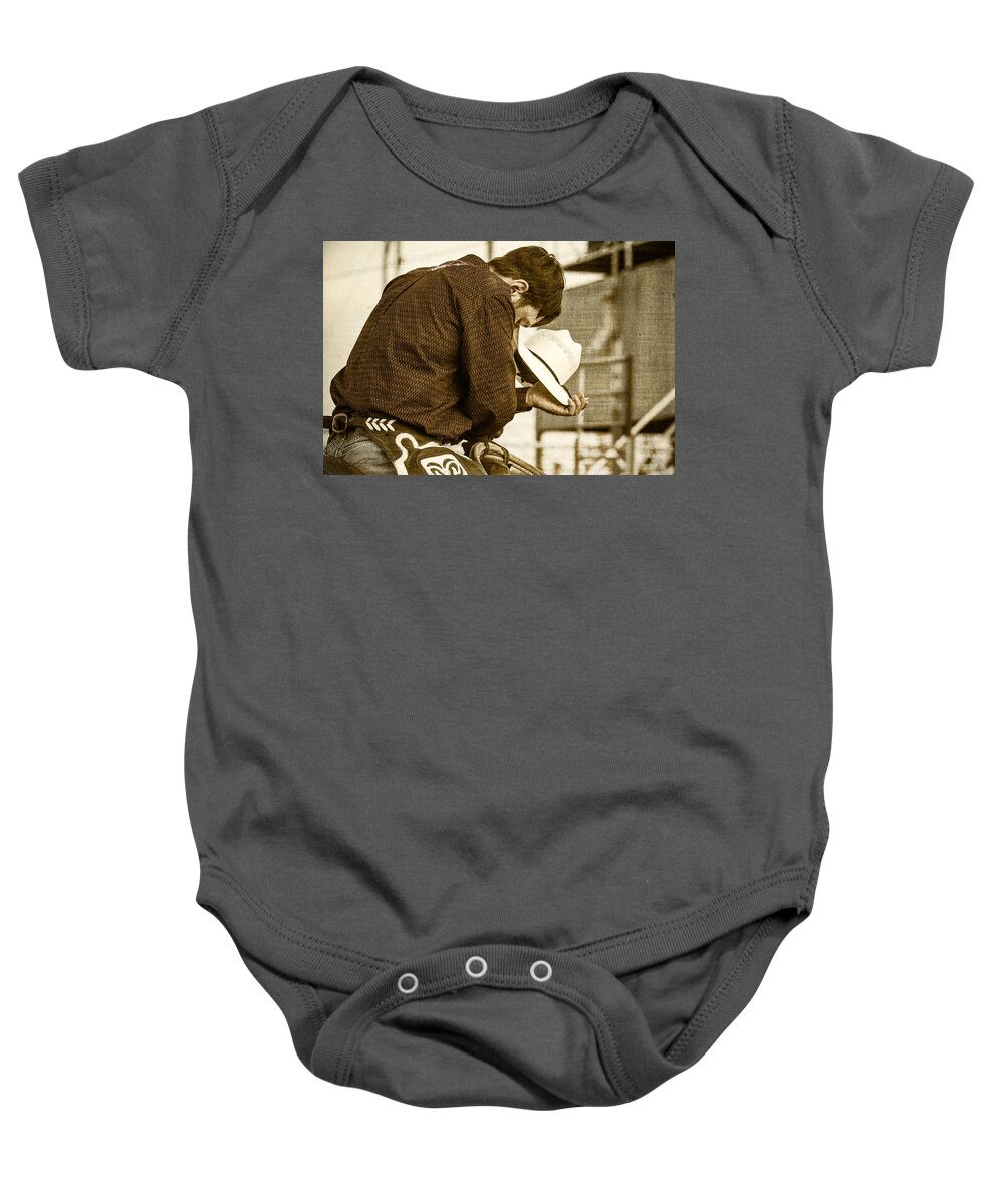 Steven Bateson Baby Onesie featuring the photograph Rodeo Cowboy Prayer by Steven Bateson