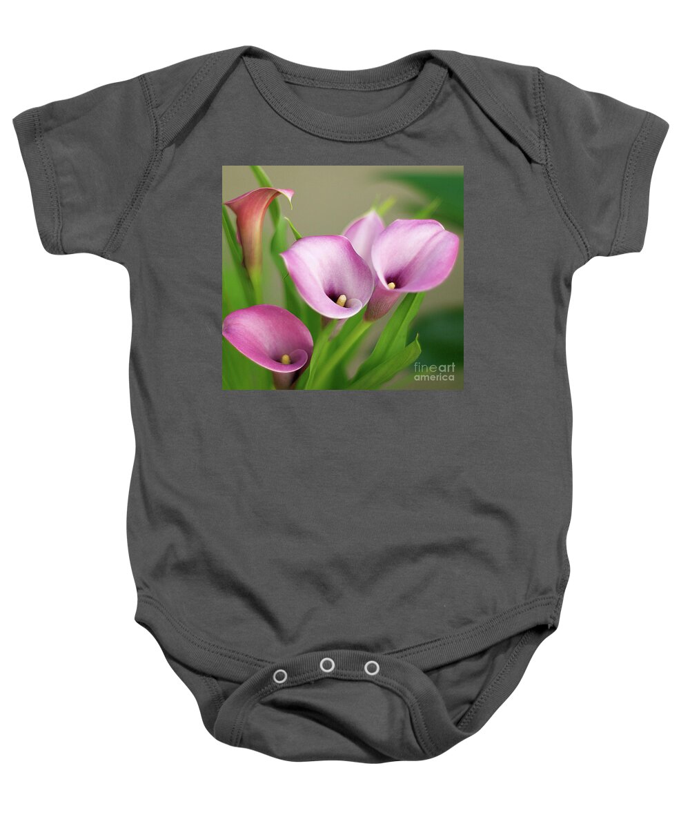 Calla Lily Baby Onesie featuring the photograph Soft Pink Calla Lilies by Byron Varvarigos