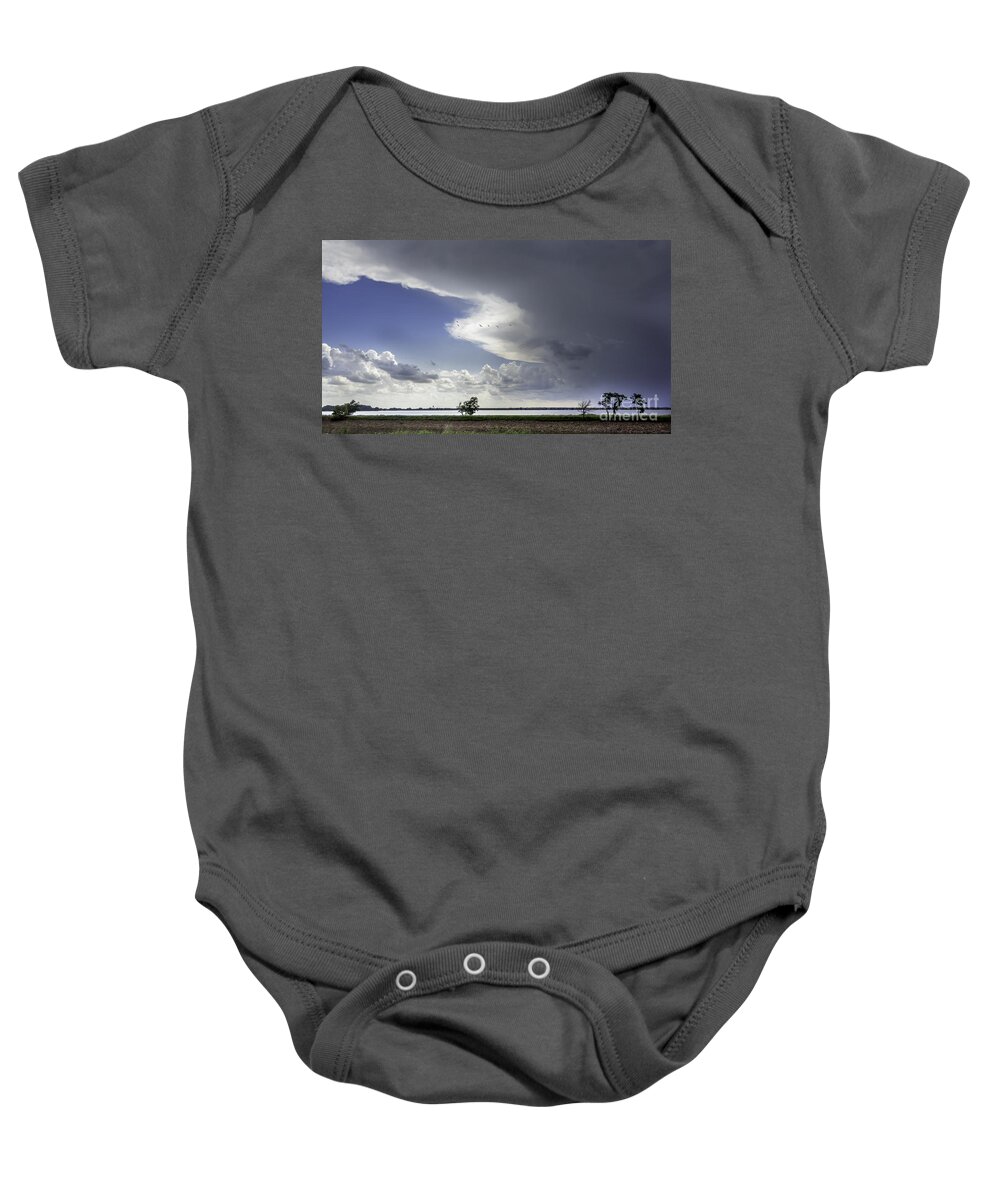 Overholser Lake Baby Onesie featuring the photograph Storm over the lake by Betty LaRue