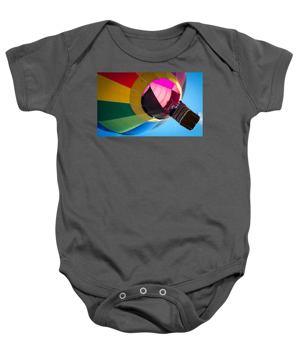 Balloon Baby Onesie featuring the photograph Sunrise Launch by Patrice Zinck