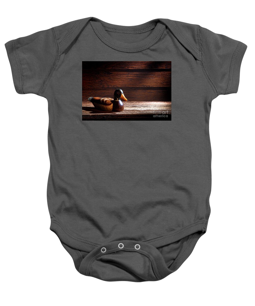 Wood Baby Onesie featuring the photograph The Decoy by Olivier Le Queinec
