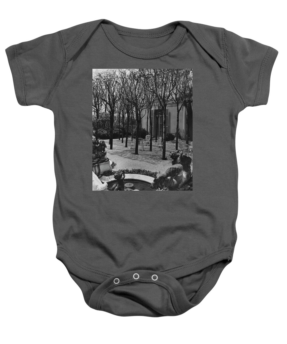 Exterior Baby Onesie featuring the photograph The Garden Of A Home In Meridian Hill by Carola Rust