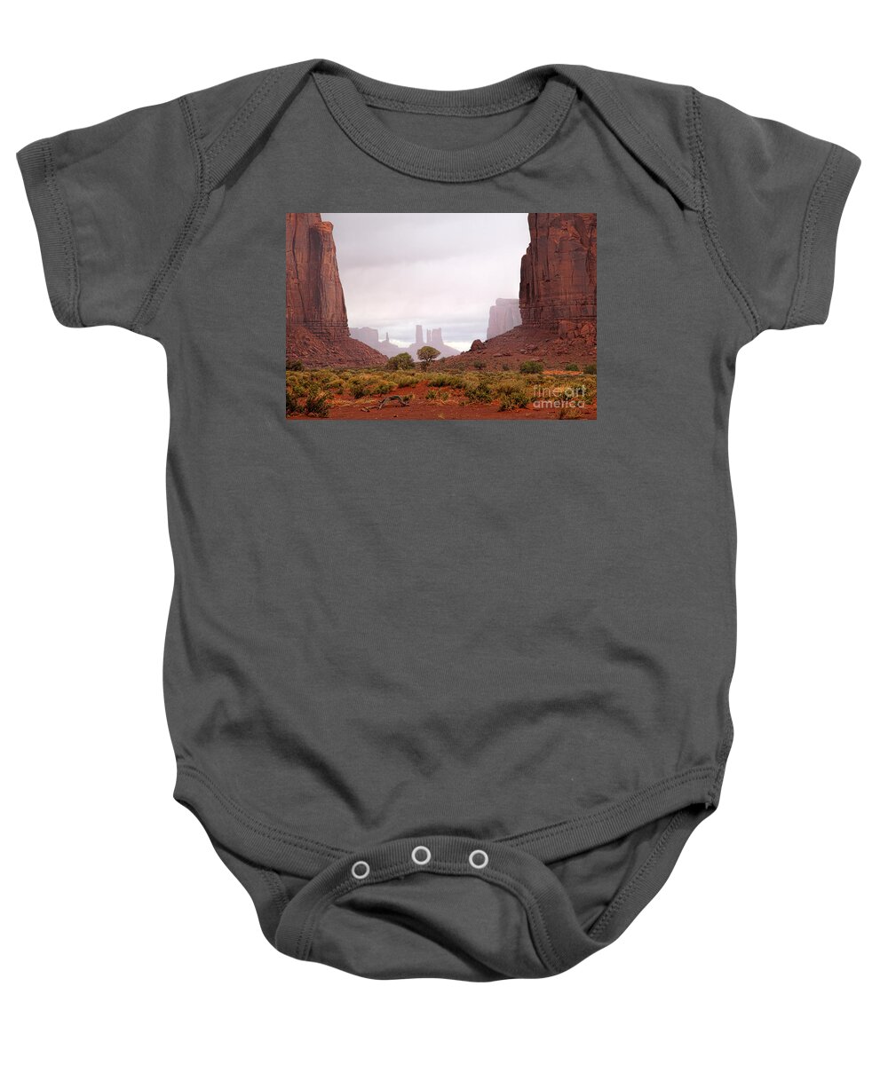 Red Rocks Baby Onesie featuring the photograph Through the Gap by Jim Garrison