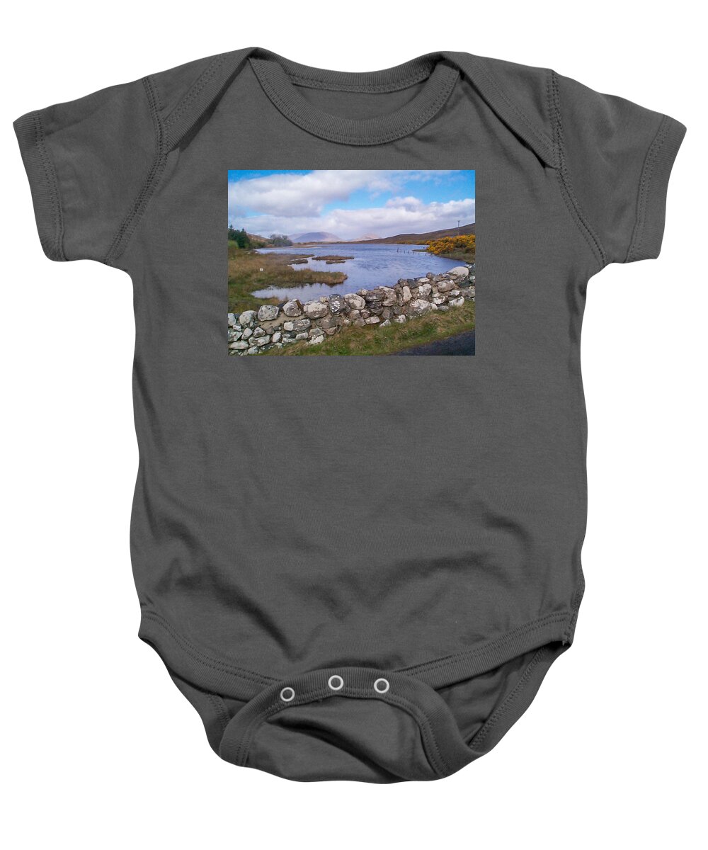 The Quiet Man Baby Onesie featuring the photograph View from Quiet Man Bridge Oughterard Ireland by Charles Kraus