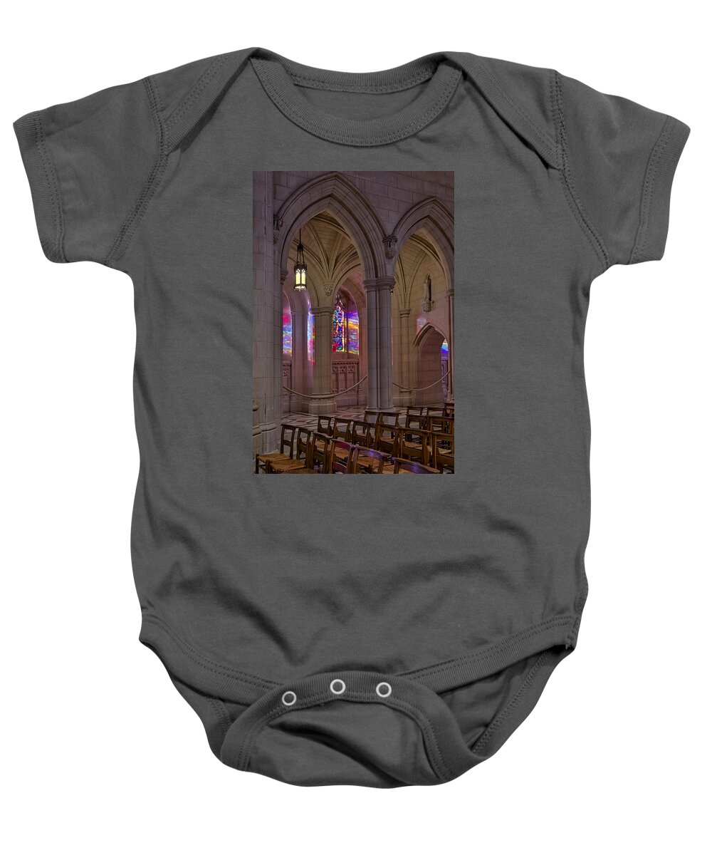 Washington Cathedral Baby Onesie featuring the photograph Washington National Cathedral Stained Glass Colors by Susan Candelario