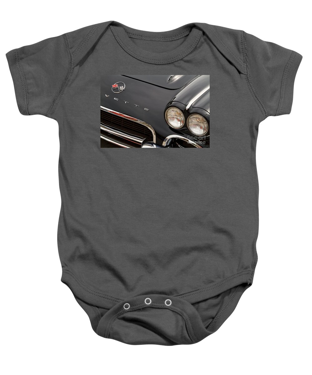 1962 Corvette Baby Onesie featuring the photograph Black Vette by Dennis Hedberg