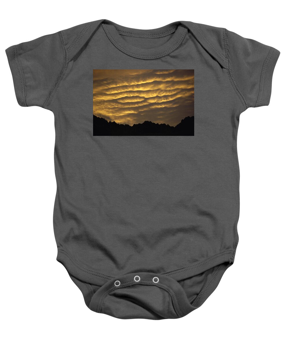 Hhh Baby Onesie featuring the photograph Cumulonimbus Clouds At Dawn by Simon Cox