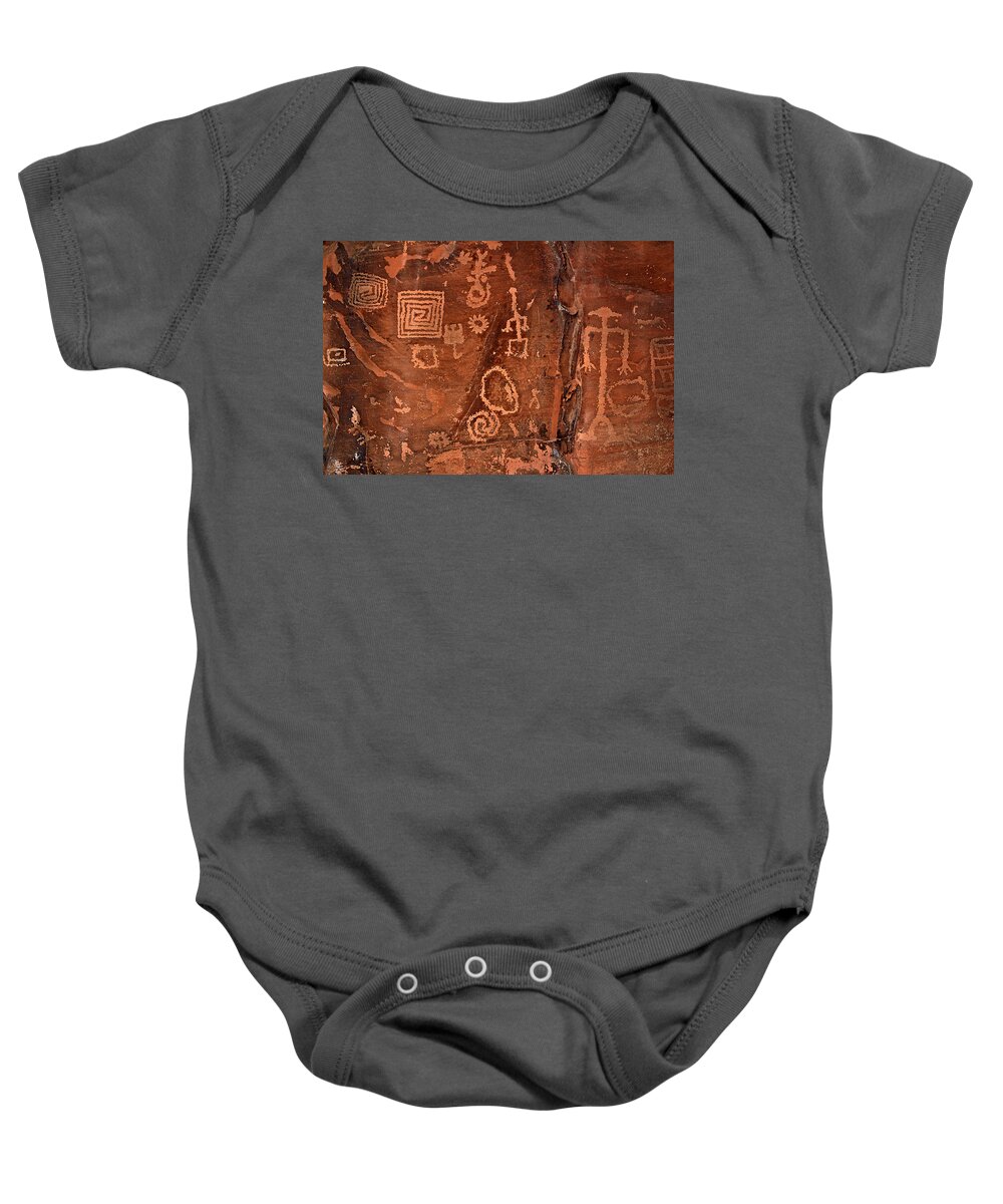 Petroglyphs Baby Onesie featuring the photograph History In Stone by Phyllis Denton