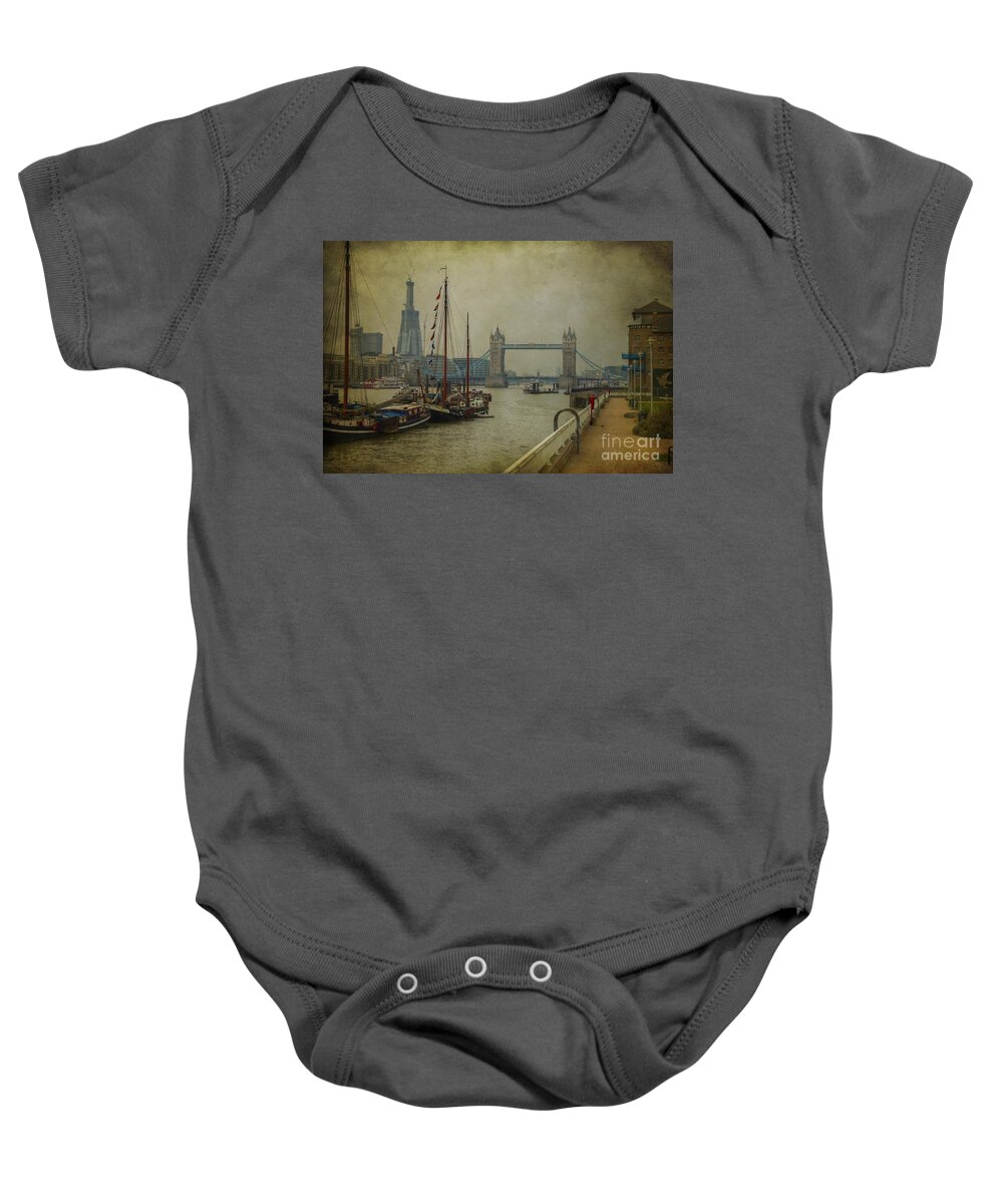 Thames Baby Onesie featuring the photograph Moored Thames Barges. by Clare Bambers