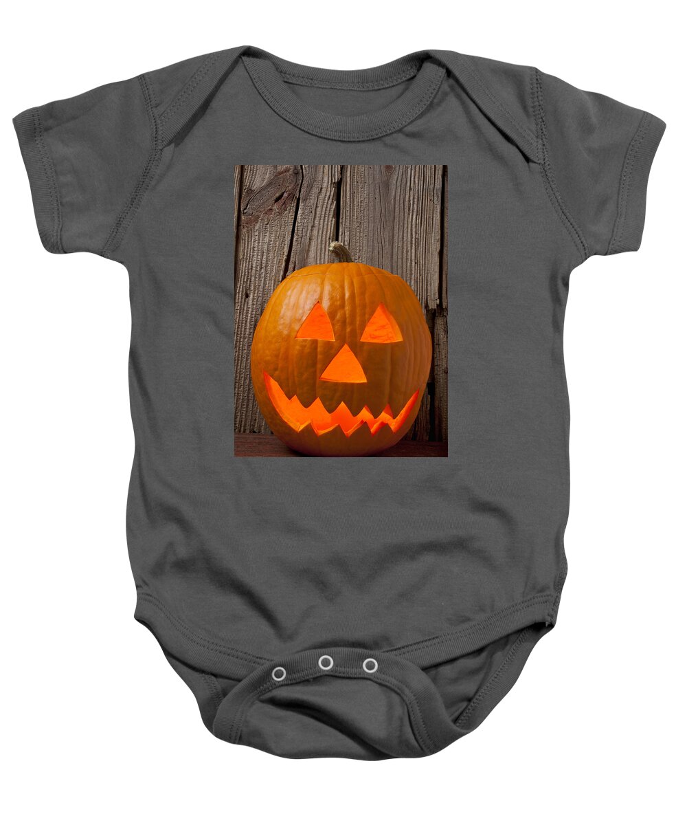 Pumpkin Baby Onesie featuring the photograph Pumpkin with wicked smile by Garry Gay
