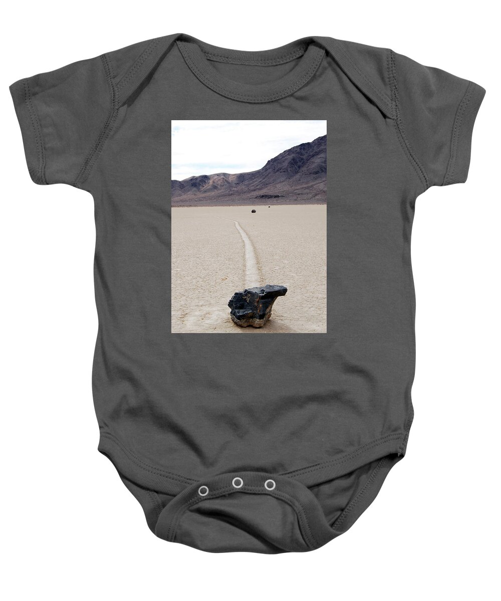 Death Valley Baby Onesie featuring the photograph Death Valley Racetrack #1 by Breck Bartholomew