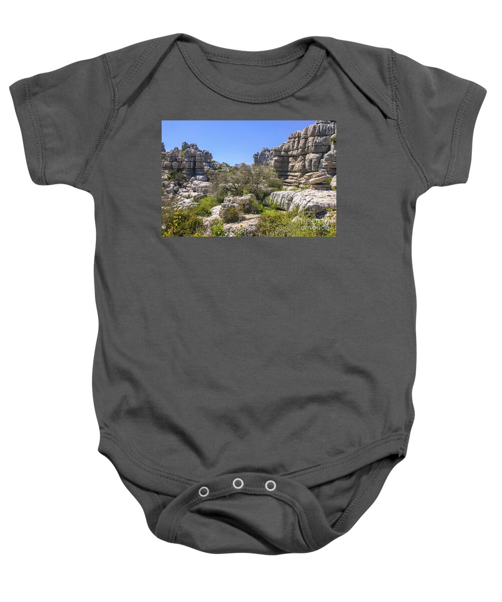 Andalusia Baby Onesie featuring the photograph El Torcal de Antequera rocks by Patricia Hofmeester