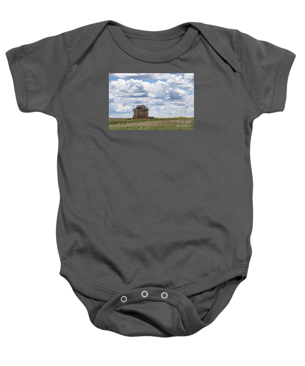 Colorado Plains Baby Onesie featuring the photograph A Solitary Existance by Jim Garrison