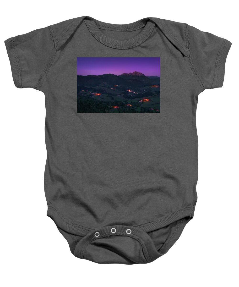 Mountain Baby Onesie featuring the photograph Aramaio valley at night by Mikel Martinez de Osaba