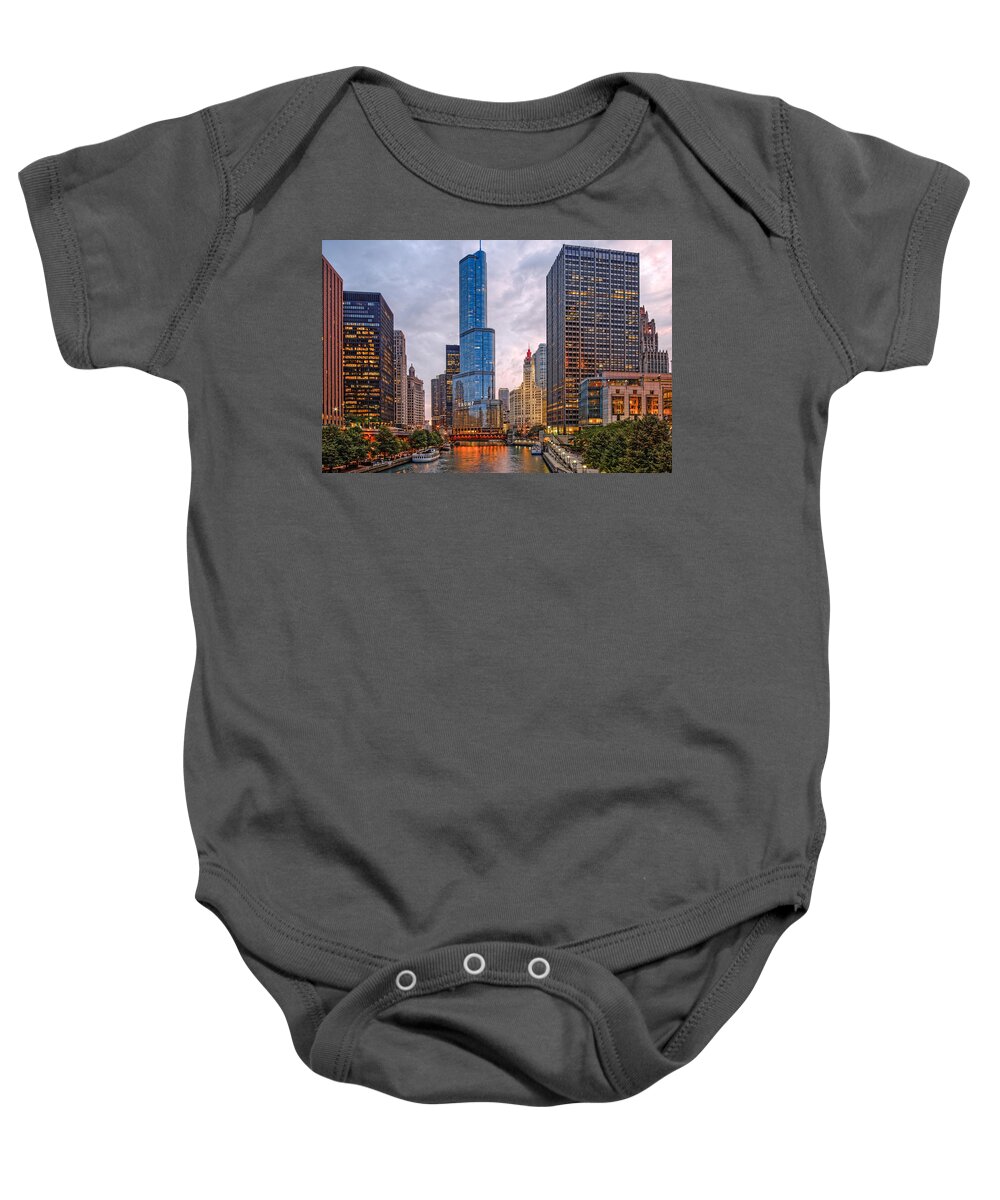 City Baby Onesie featuring the photograph Chicago Riverwalk Equitable Wrigley Building and Trump International Tower and Hotel at Sunset by Silvio Ligutti