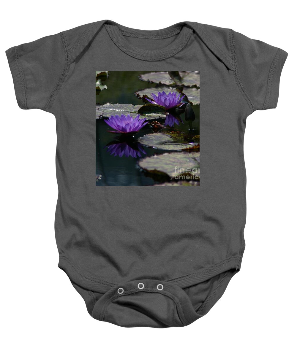 Cobalt Baby Onesie featuring the photograph Cobalt Purple Lotus Waterlilies by Jackie Irwin