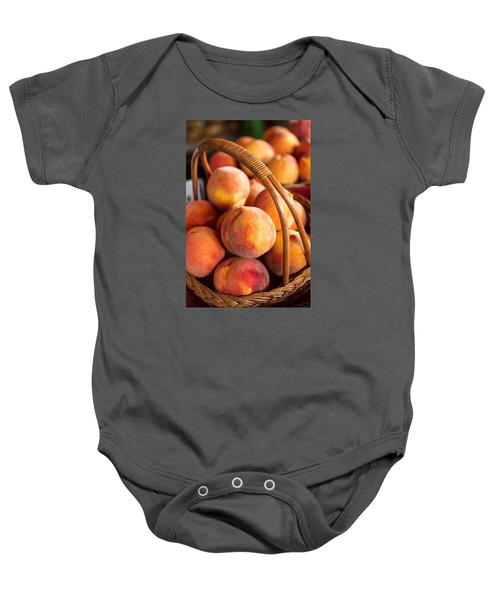 Agriculture Baby Onesie featuring the photograph Colorado Peaches in Basket by Teri Virbickis