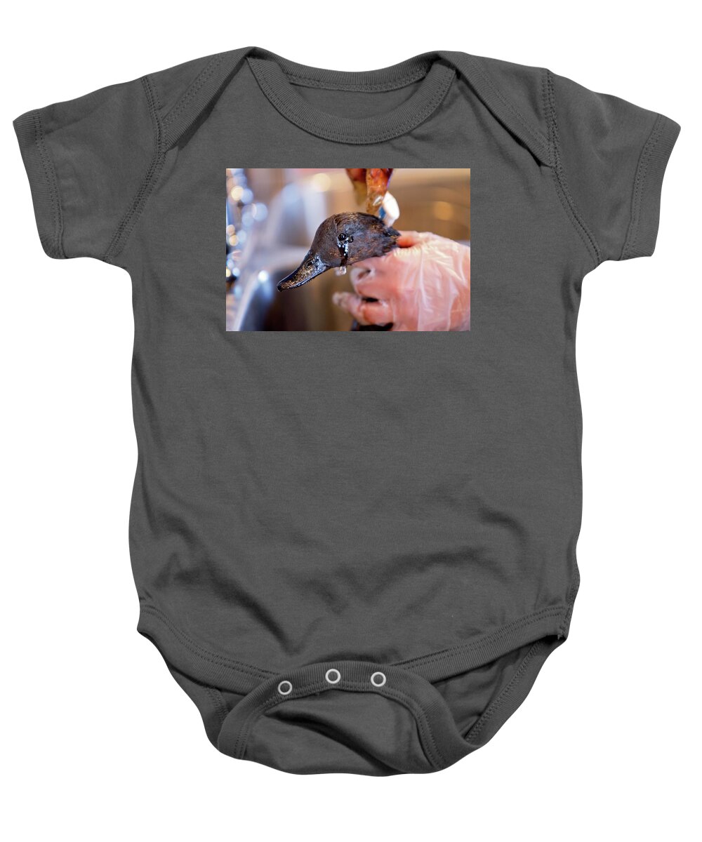 Environment Baby Onesie featuring the photograph Crying over Spilled Oil by Eilish Palmer