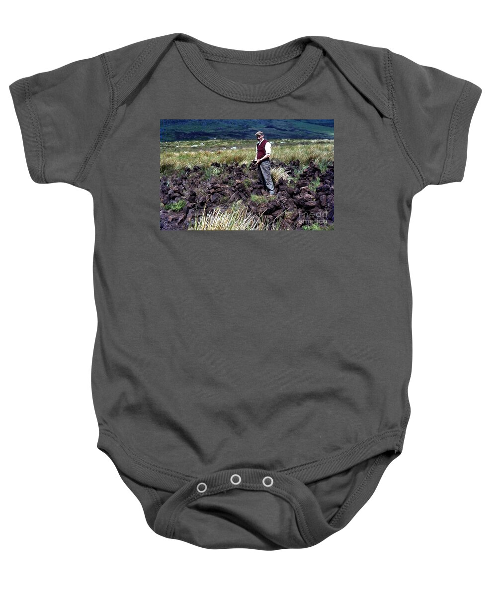 Turf Cutting Baby Onesie featuring the photograph Cutting turf on The Comeragh Mountains by Joe Cashin