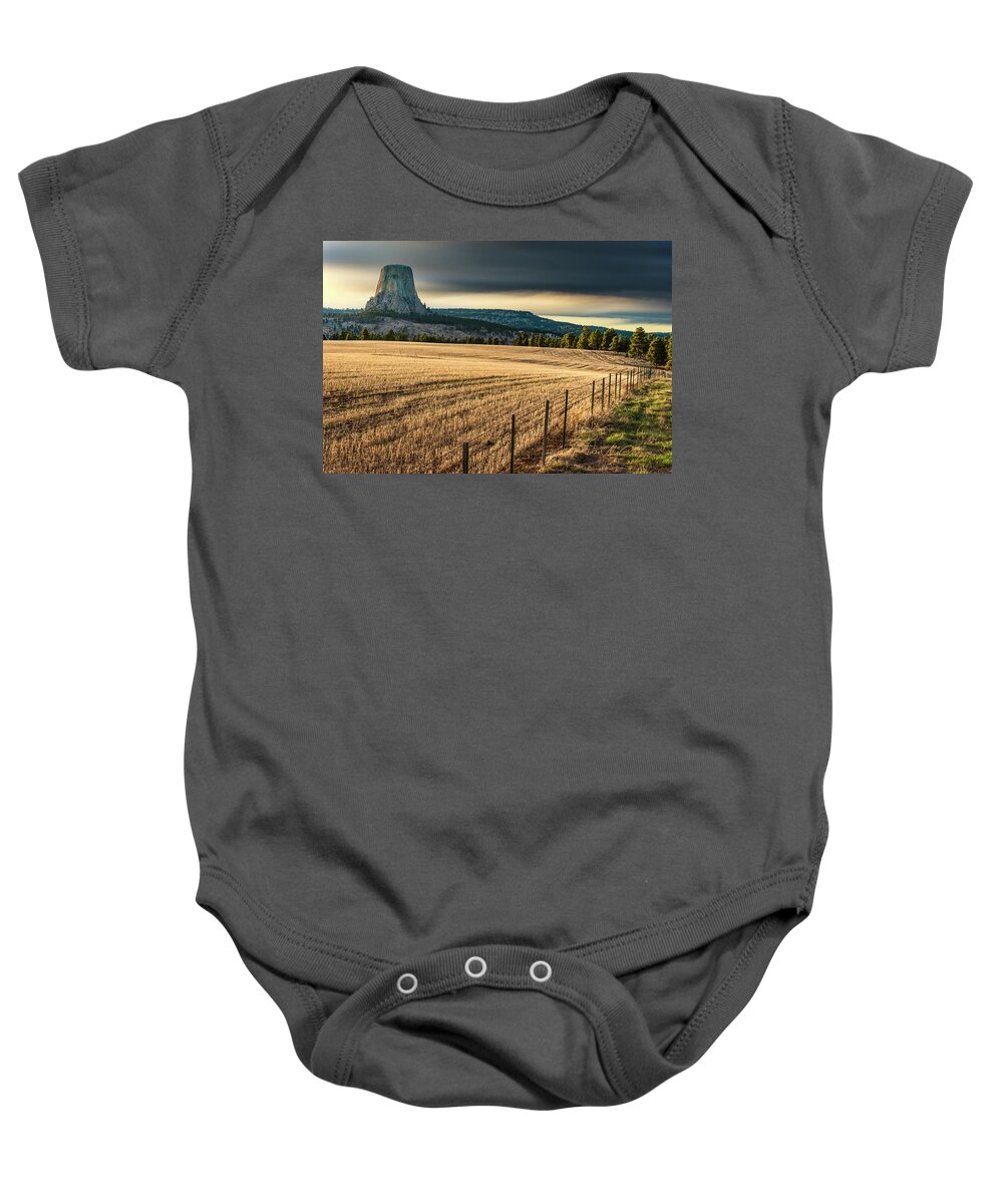 Devil's Tower Baby Onesie featuring the photograph Devil's Field by Dan McGeorge