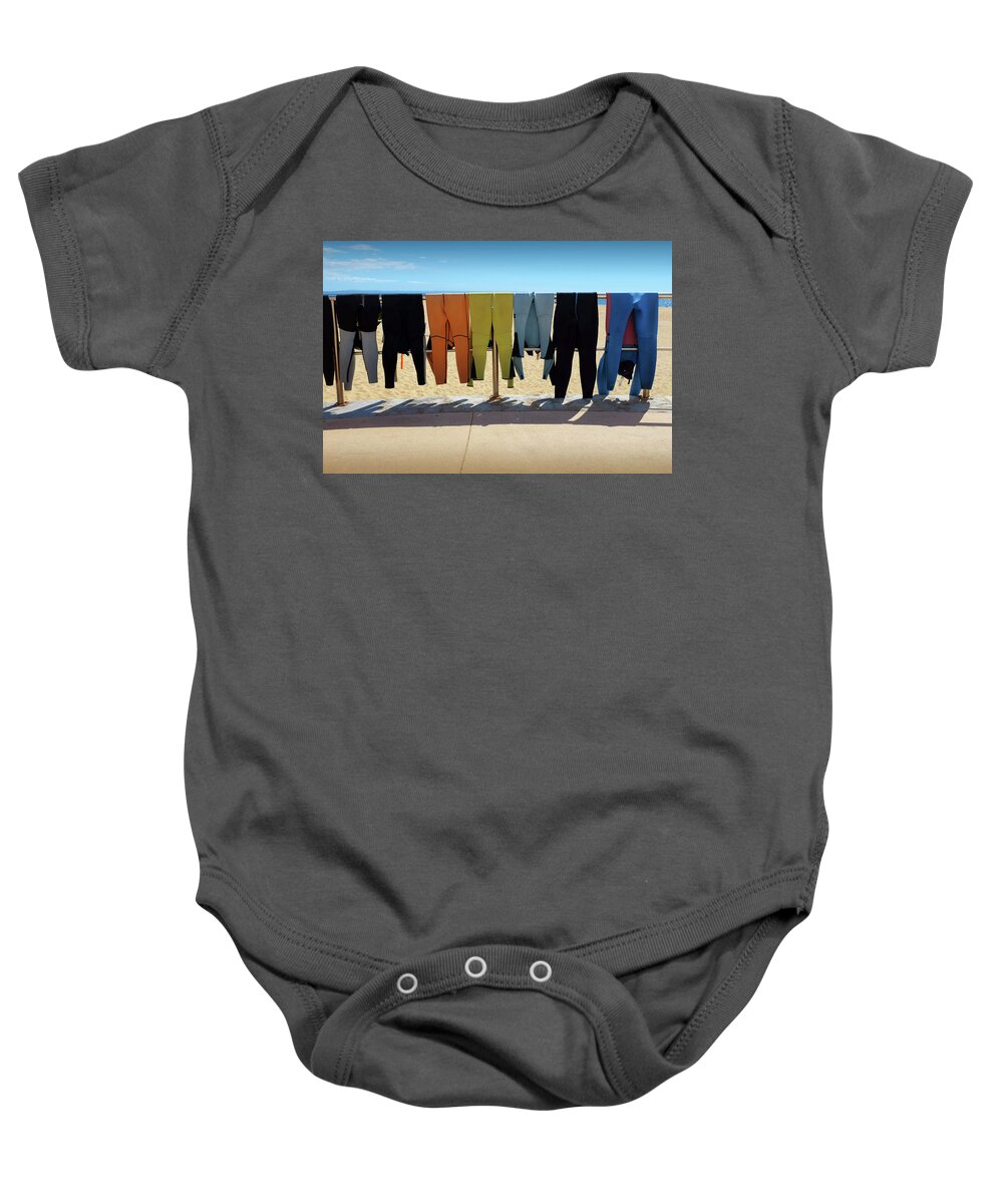 Adventure Baby Onesie featuring the photograph Drying Wet Suits by Carlos Caetano