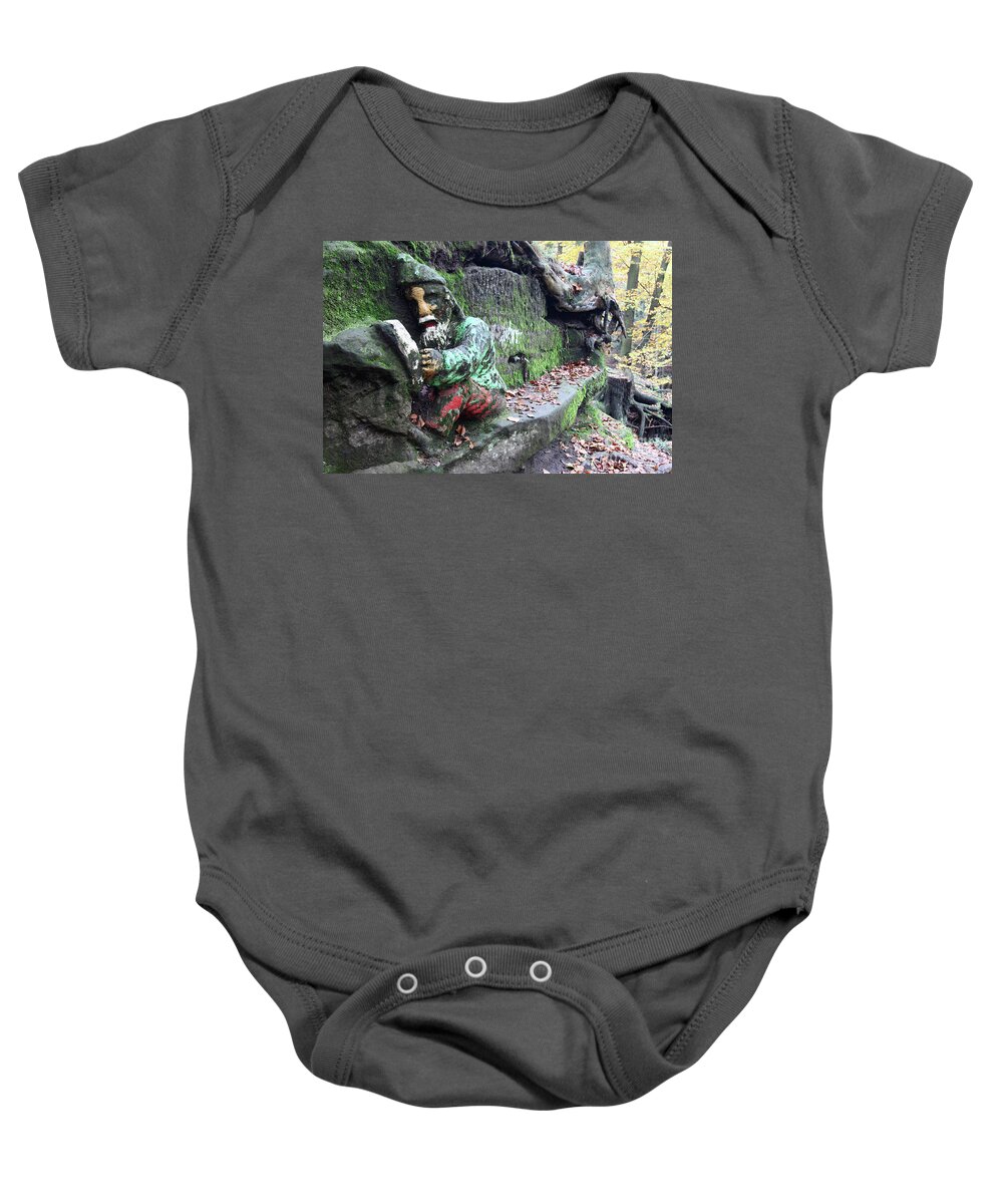 Dwarf Baby Onesie featuring the photograph Dwarf reading a book - rock relief by Michal Boubin
