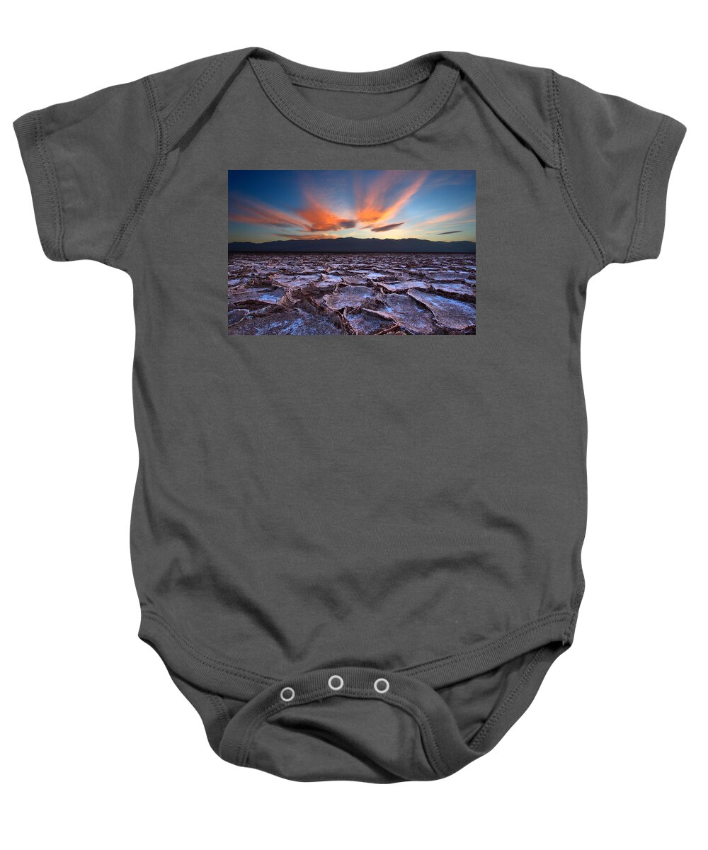 Badwater; Below Sea Level; Death Valley; Landscape; Minus 282; Mud; National Park; Ridges; Salt; Salt Pan; Sunset; Baby Onesie featuring the photograph Fire in the Sky and Embers Down Below by David Andersen