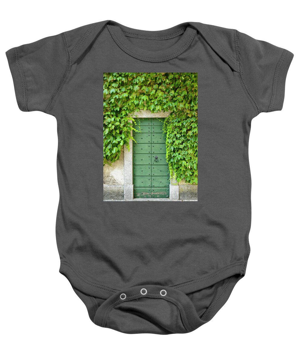 Architecture Baby Onesie featuring the photograph Green door and Ivy by Oscar Gutierrez