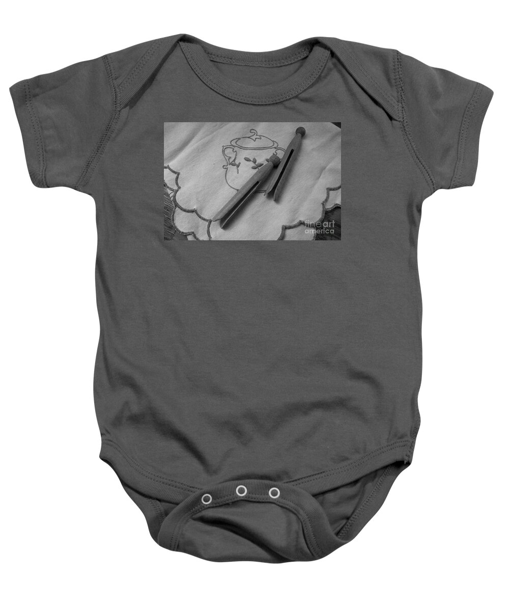 Clothes Pins Baby Onesie featuring the photograph He Snored by Ann E Robson