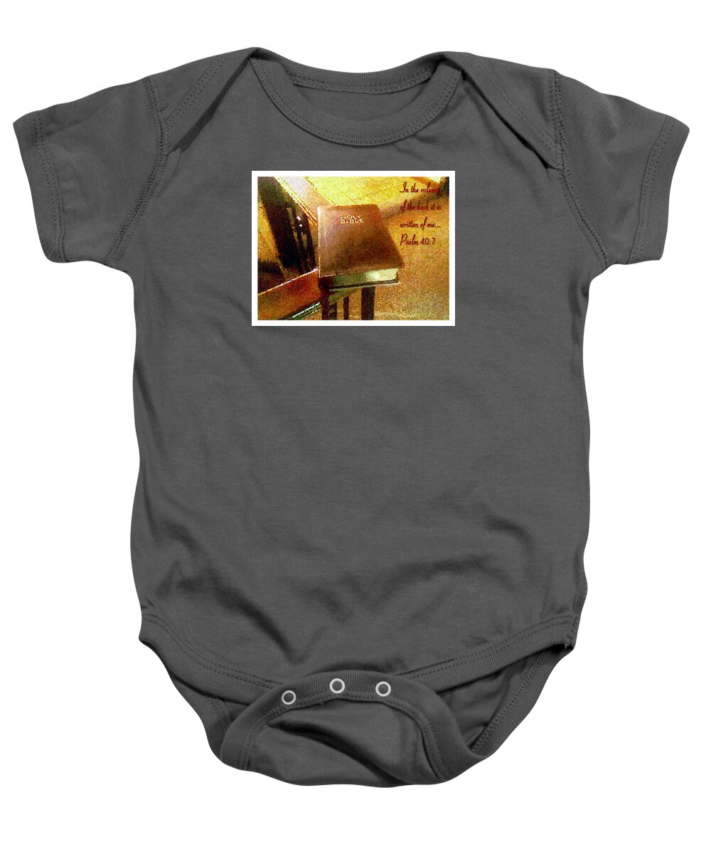 The Bible Baby Onesie featuring the photograph In The Volume Of The Book by Glenn McCarthy Art and Photography