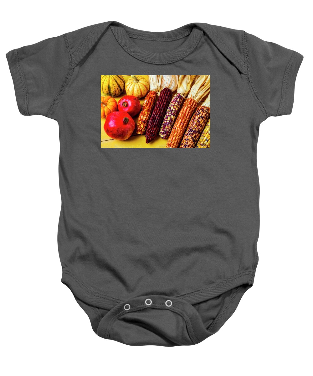 Pomegranates Baby Onesie featuring the photograph Indian Corn And Pomegranates by Garry Gay