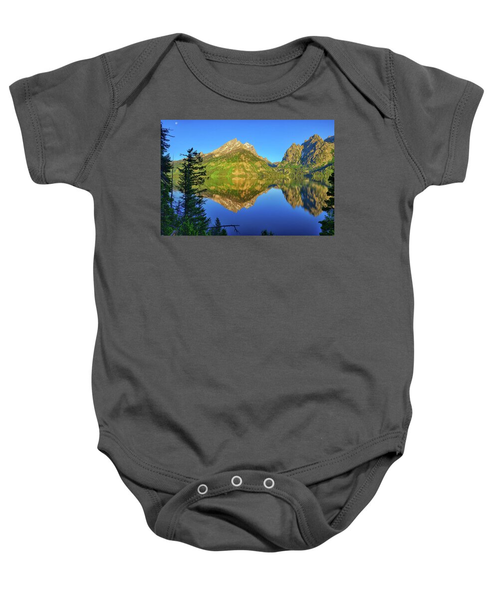 Jenny Lake Baby Onesie featuring the photograph Jenny Lake Morning Reflections by Greg Norrell
