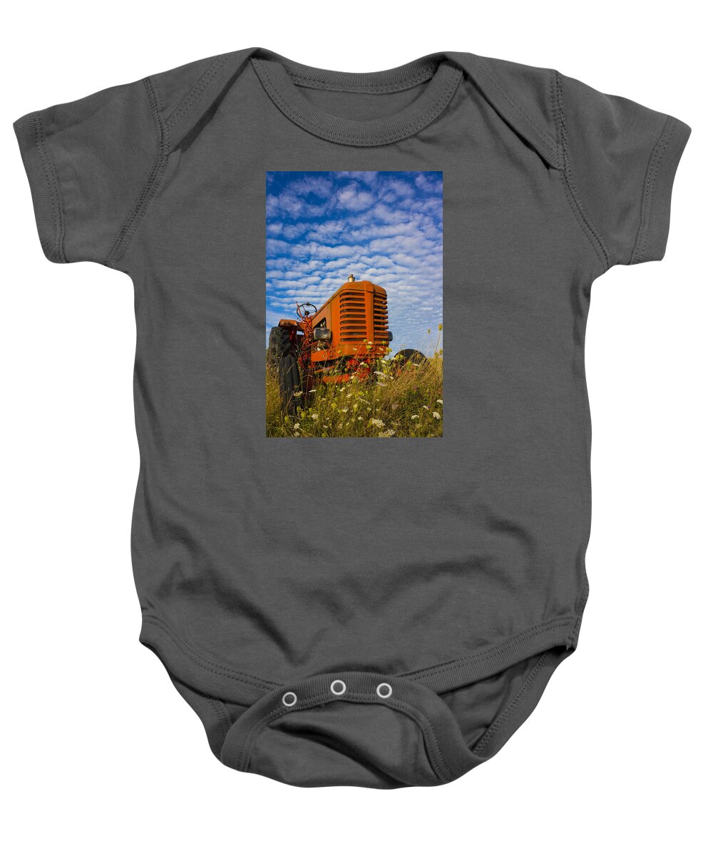 Tractor Baby Onesie featuring the photograph Little red Tractor by John Paul Cullen