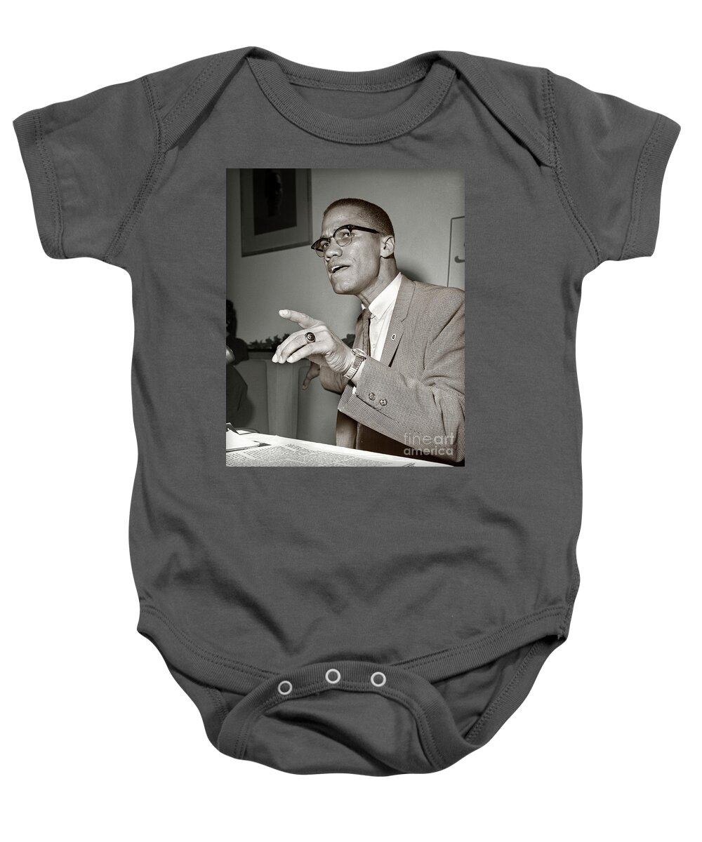 Nation Of Islam Baby Onesie featuring the photograph Malcolm X by Martin Konopacki Restoration