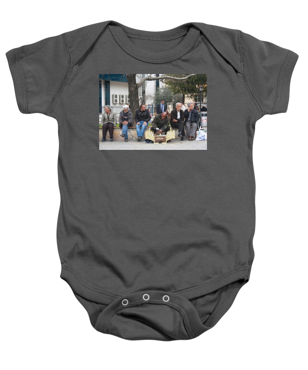 Mugla Baby Onesie featuring the photograph Man Polishing Leather Shoes Shoeshine On Street Mugla Turkey by Taiche Acrylic Art