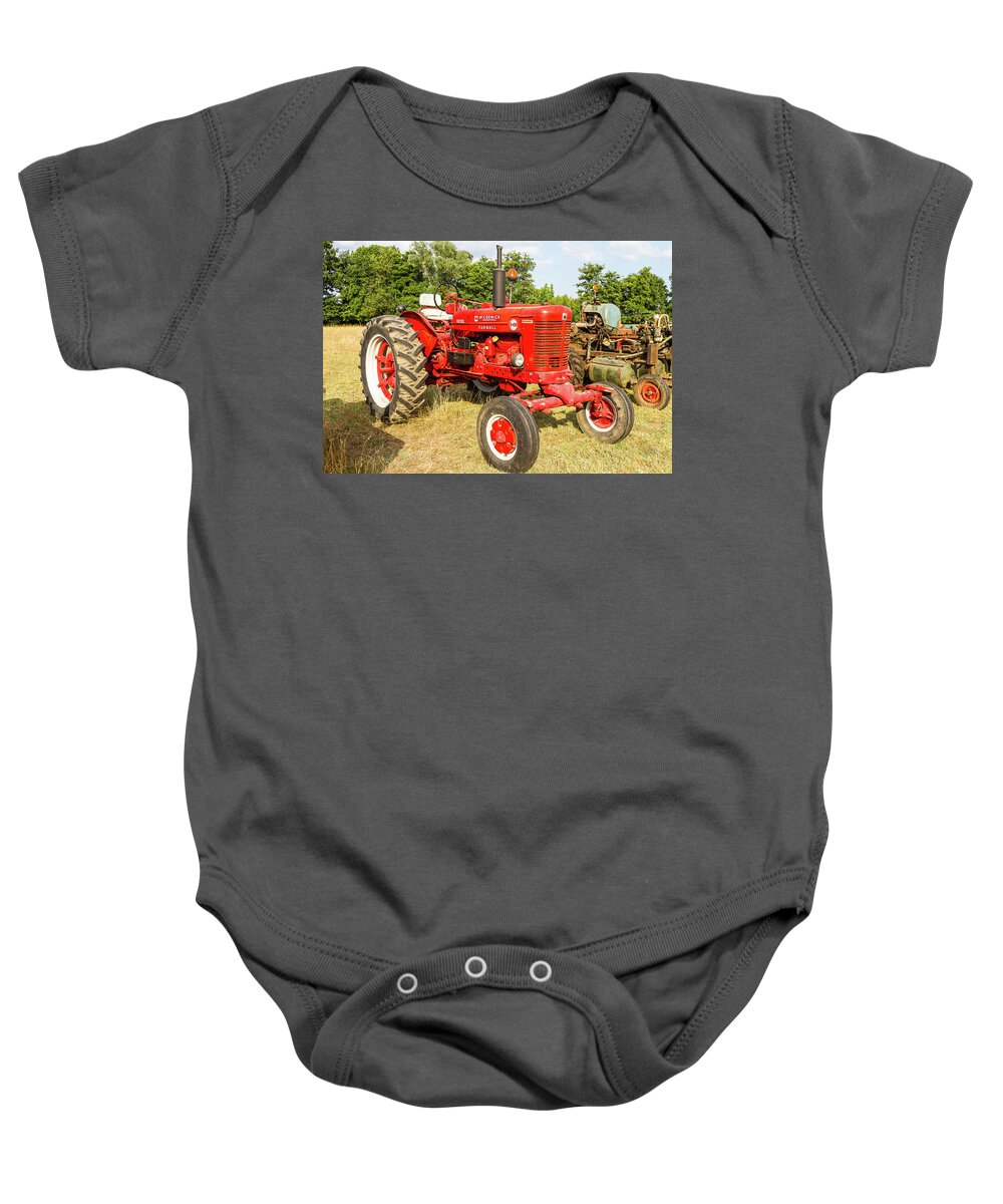 Old Farm Tractor Baby Onesie featuring the photograph Mc Cormick Farmall B 450 by Paul MAURICE