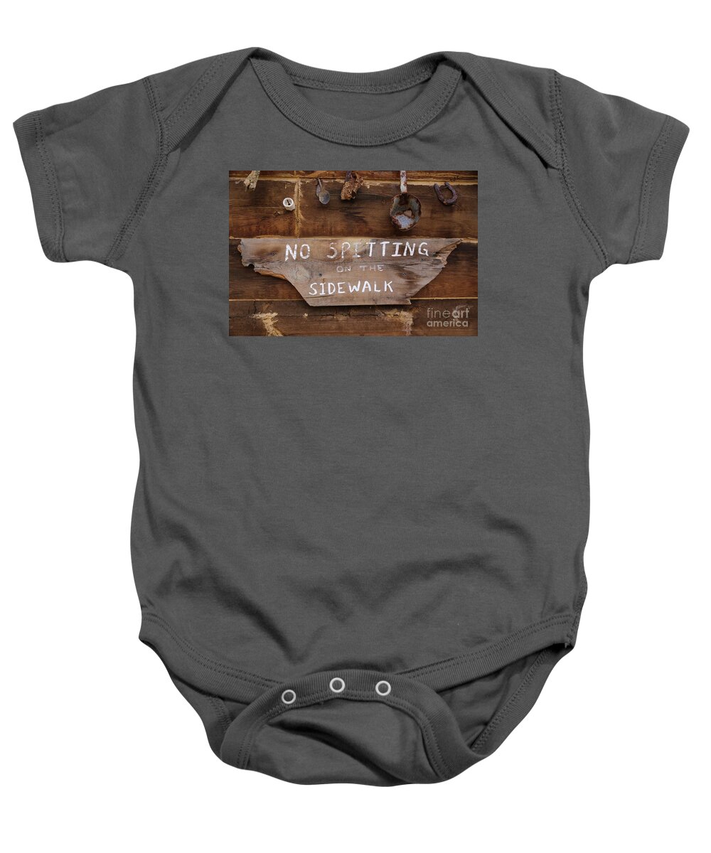No Spitting Baby Onesie featuring the photograph No Spitting by Lynn Sprowl