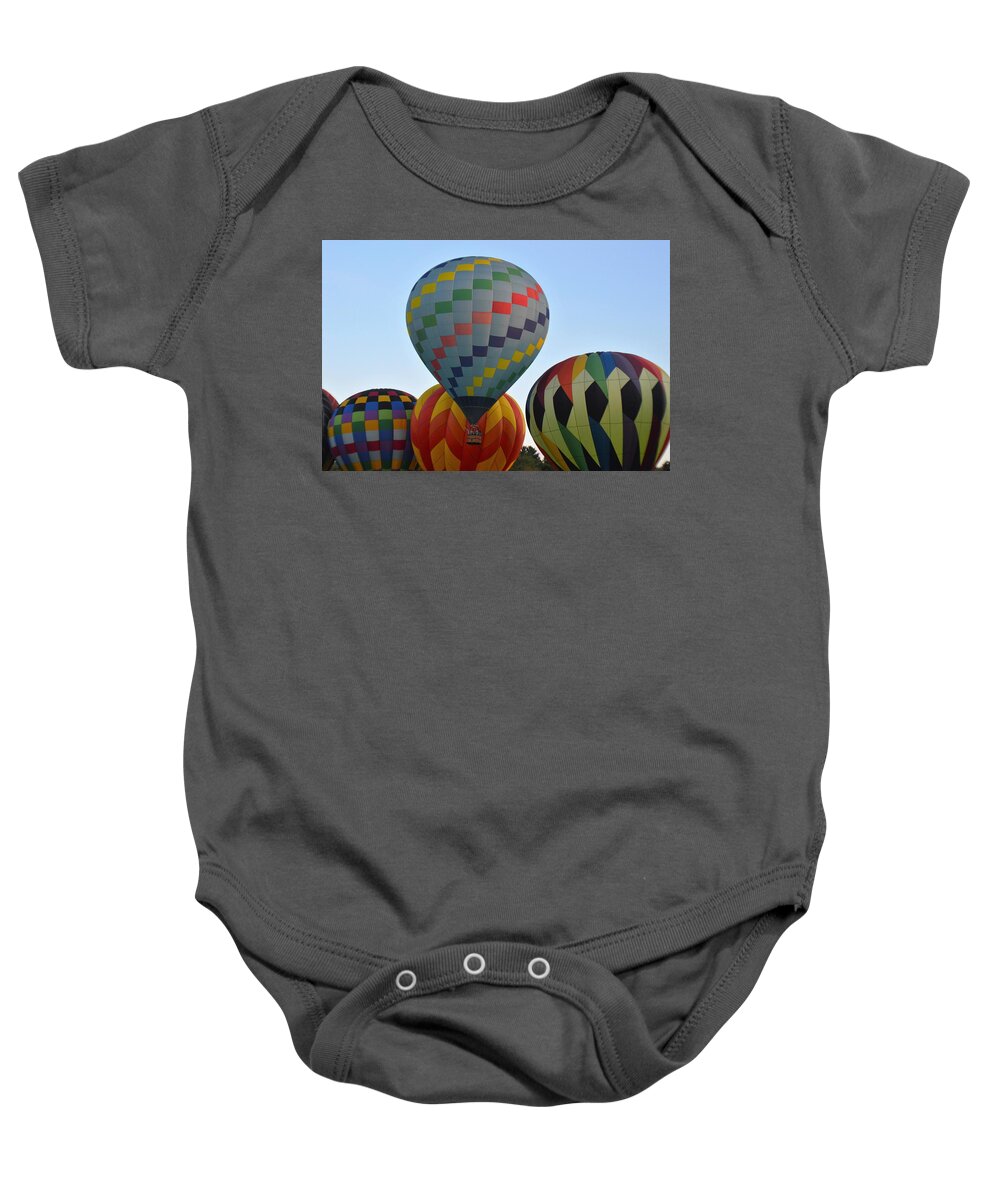 Balloons Baby Onesie featuring the photograph Off We Go by Charles HALL