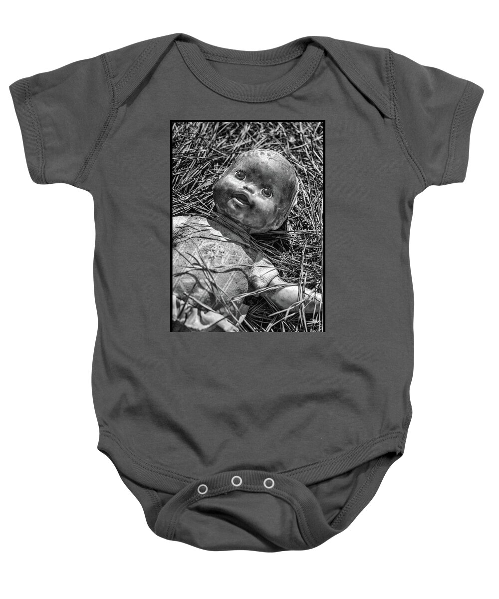 Antique Doll Baby Onesie featuring the photograph Old Dolls In Grass by Matthew Pace