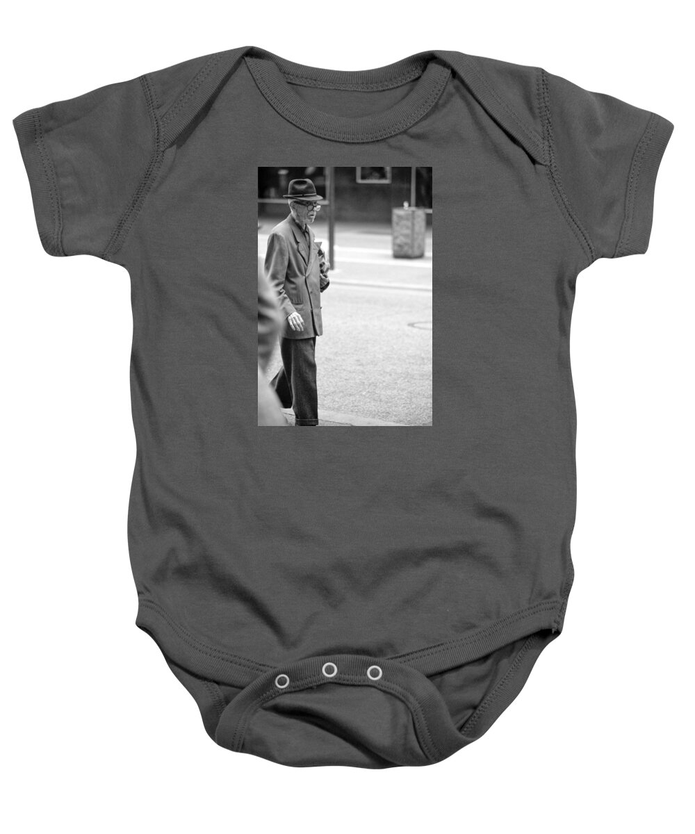 Actions Baby Onesie featuring the photograph Out for a stroll by Mike Evangelist