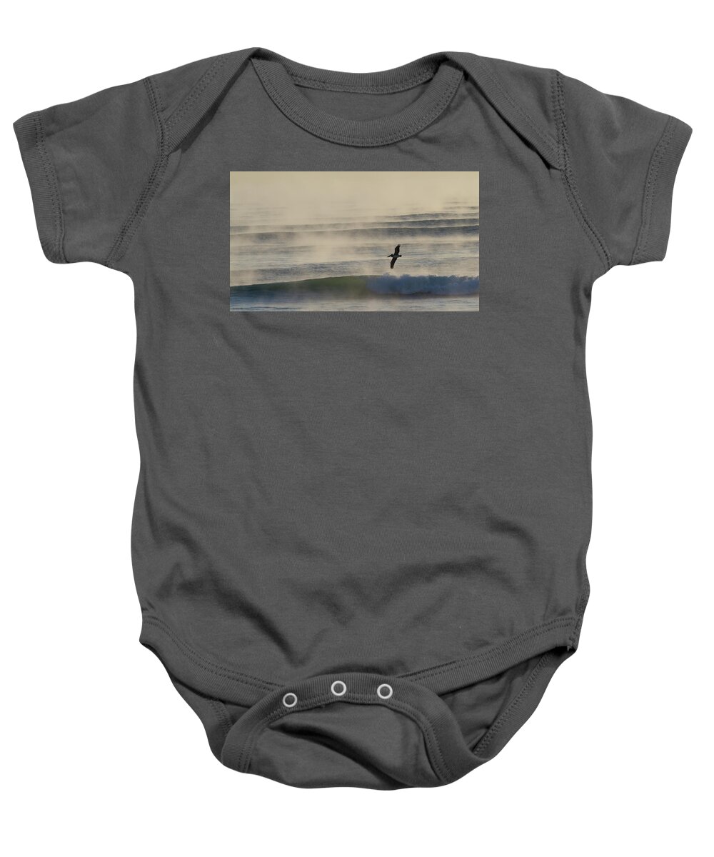 Pelican Baby Onesie featuring the photograph Pelican in Sea Smoke by Paul Rebmann